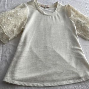 Anthropology ivory t-shirt with embroidered full sleeve. Eri + Ali. Size small.